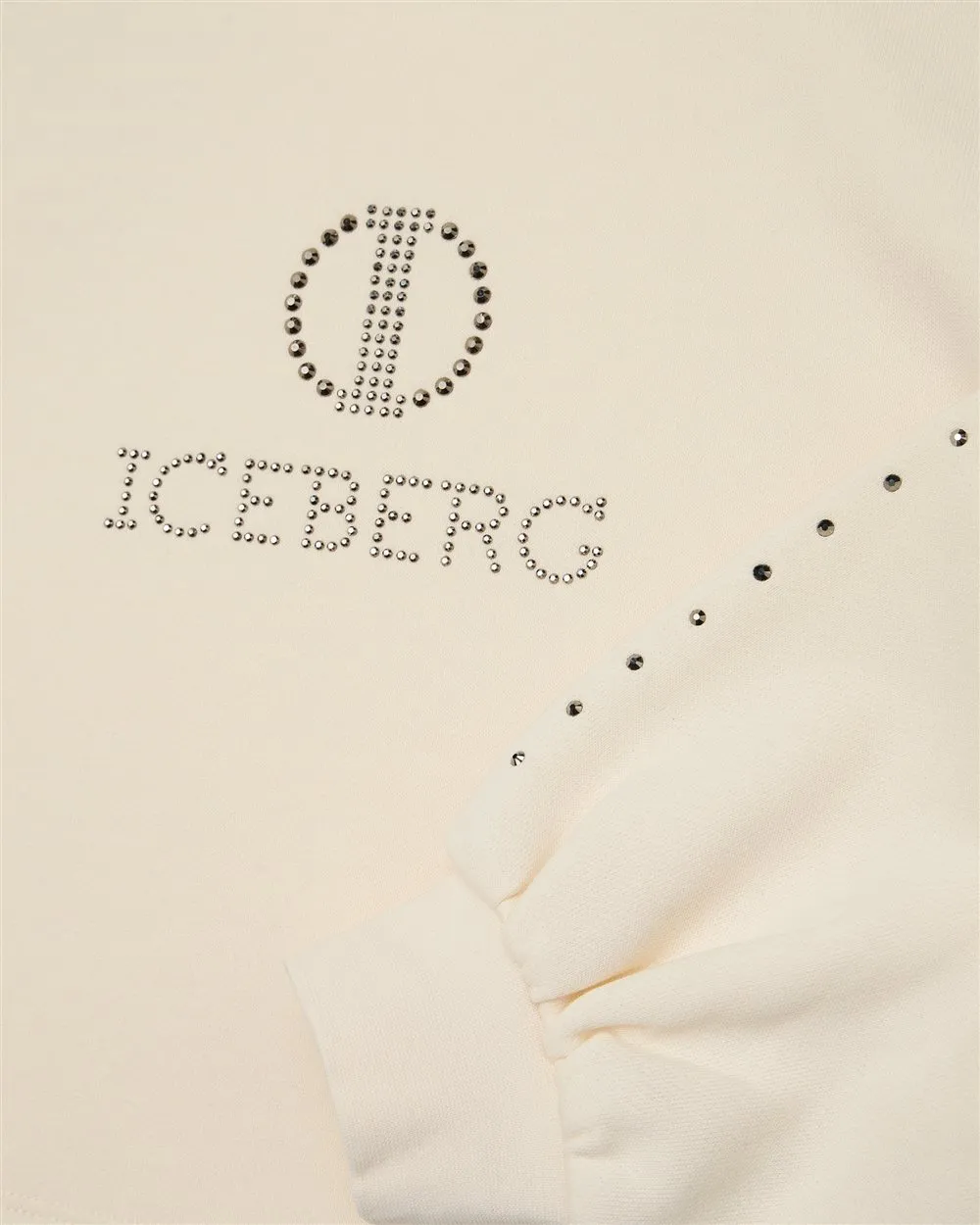 Felpa color panna modello crop con borchie e logo